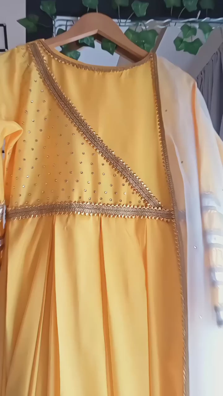 Yellow China Silk Three Piece Festive Frock With Organza Dupatta.